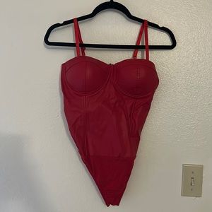 Red leather corset bodysuit